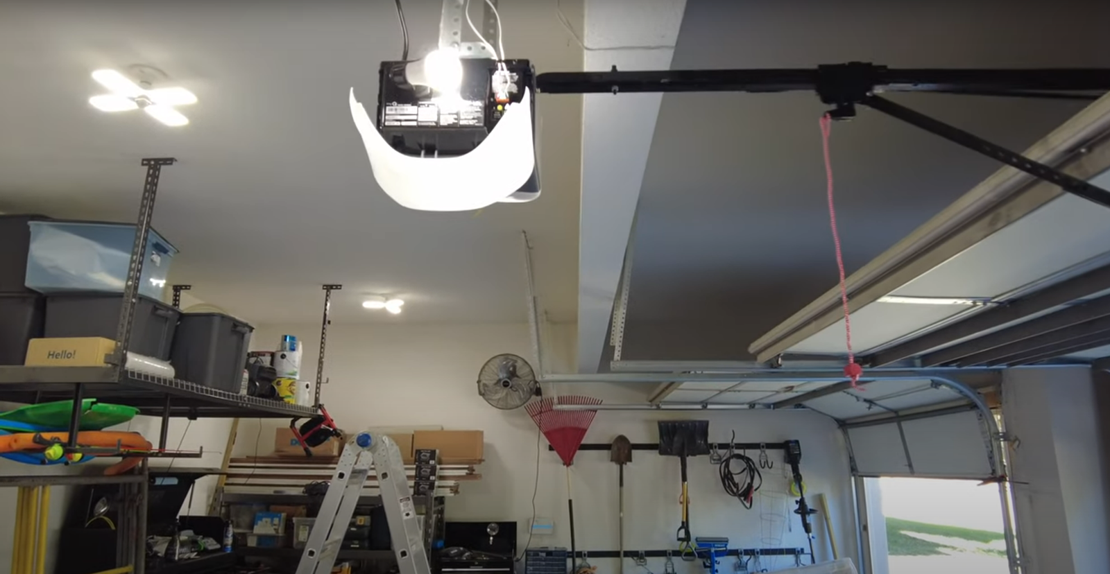 Modern smart Wi-Fi belt drive garage door opener with camera installed in Gulf Gate Estates