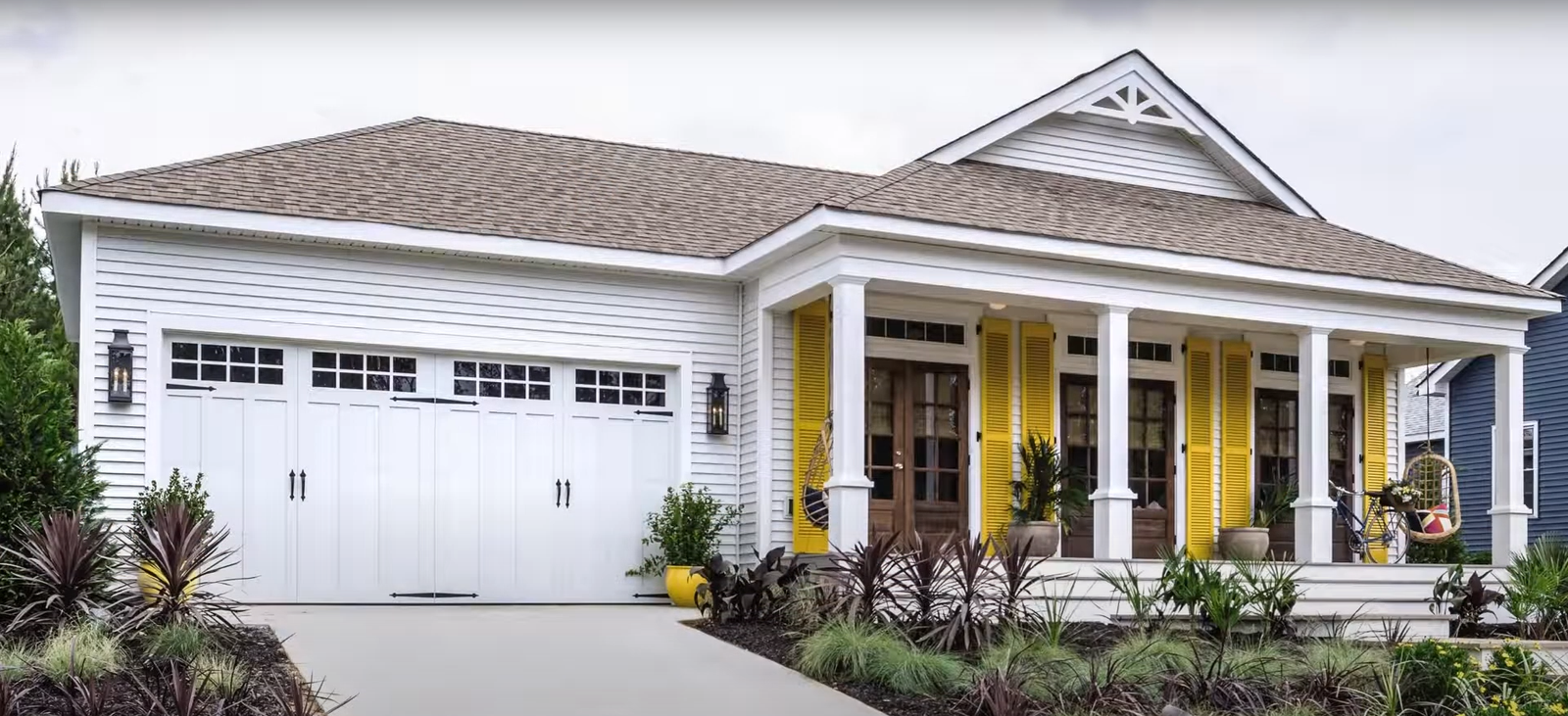 Professional repairing a garage door track in Laurel, Florida, showcasing trusted local garage door repair services