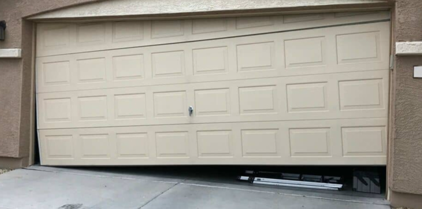 Garage door off track requiring professional repair