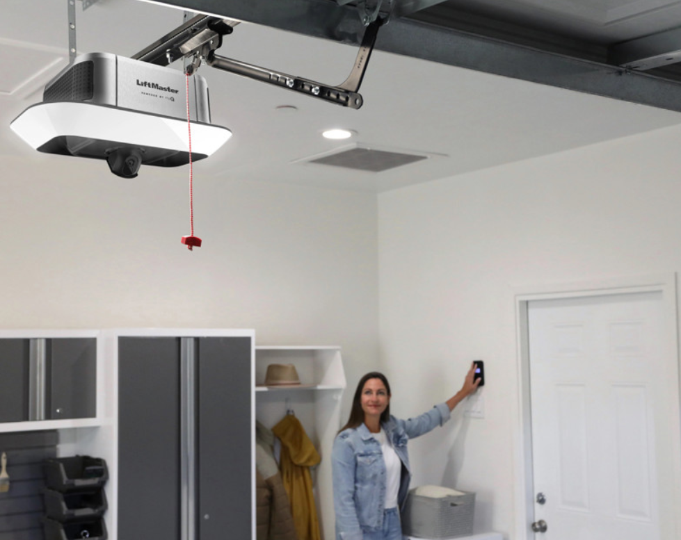 Professional garage door opener repair technician servicing a unit in Florida