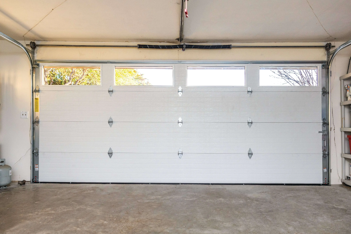 Standard garage door susceptible to high winds in Florida